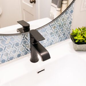 oil rubbed bronze faucet in eco-friendly bathroom renovation